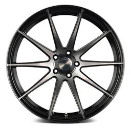 ABS Wheels F22 Svart aluminiumsfelger montert på bil i en stemningsfull omgivelse