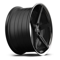 ABS Wheels F55 Black alloy wheel mounted on car in an atmospheric setting