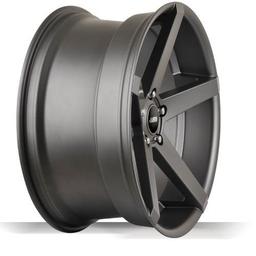 ABS Wheels 355 Grå aluminiumsfælge monteret på bil i en stemningsfuld omgivelse