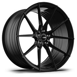 ABS Wheels F15 Sort aluminiumsfælge monteret på bil i en stemningsfuld omgivelse