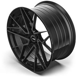 ABS Wheels F28 Svart aluminiumsfelger montert på bil i en stemningsfull omgivelse