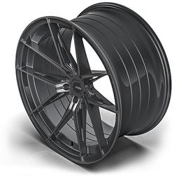 ABS Wheels F35 Grå aluminiumfälg monterade på bil i stämnigsfull miljö