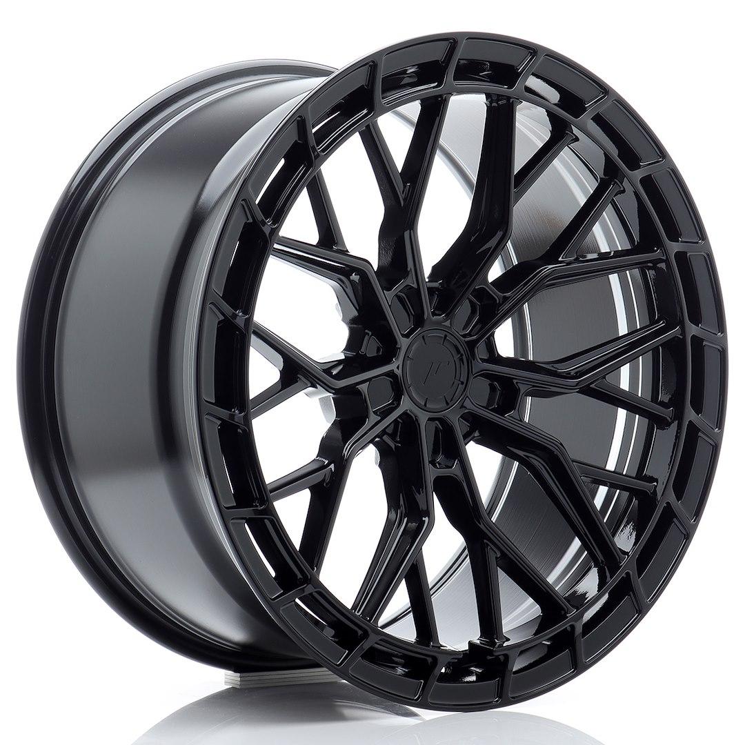 JR Wheels JR48 Svart aluminiumsfelger montert på bil i en stemningsfull omgivelse
