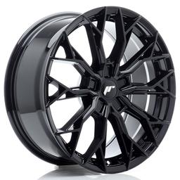 JR Wheels JR49 Black alloy wheel mounted on car in an atmospheric setting