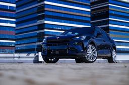 JR Wheels JR49 Silver alloy wheel mounted on car in an atmospheric setting