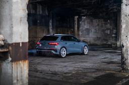 JR Wheels JR50 Silver alloy wheel mounted on car in an atmospheric setting