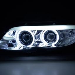 Chromed angel eyes head lamps BMW X5
