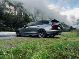 Imaz Wheels IM14 Grey alloy wheel mounted on car in an atmospheric setting