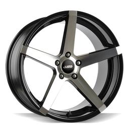 ABS Wheels 355 Black alloy wheel mounted on car in an atmospheric setting