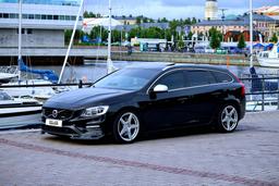 Imaz Wheels IM14 Silver alloy wheel mounted on car in an atmospheric setting