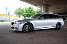 Imaz Wheels FF593 Grey alloy wheel mounted on car in an atmospheric setting