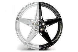 Imaz Wheels IM14 Musta alumiinivanteet asennettuna autoon tunnelmallisessa ympäristössä