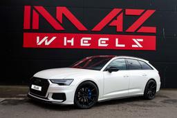 Imaz Wheels FF499 Sort aluminiumsfælge monteret på bil i en stemningsfuld omgivelse