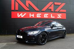 Imaz Wheels FF2 Sort aluminiumsfælge monteret på bil i en stemningsfuld omgivelse