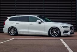 Imaz Wheels FF675 Black alloy wheel mounted on car in an atmospheric setting