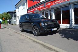 Imaz Wheels IM14 Grey alloy wheel mounted on car in an atmospheric setting