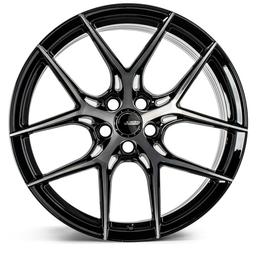 ABS Wheels F5 Svart aluminiumsfelger montert på bil i en stemningsfull omgivelse