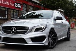 Imaz Wheels IM5R Grey alloy wheel mounted on car in an atmospheric setting