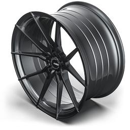 ABS Wheels F15 Grå aluminiumsfelger montert på bil i en stemningsfull omgivelse