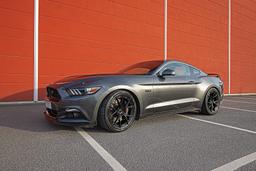 Imaz Wheels FF2 Black alloy wheel mounted on car in an atmospheric setting