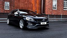 Imaz Wheels IM14 Silver alloy wheel mounted on car in an atmospheric setting