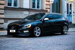 Imaz Wheels IM14 Silver alloy wheel mounted on car in an atmospheric setting