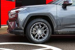 Imaz Wheels FF90 Grey alloy wheel mounted on car in an atmospheric setting