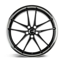 ABS Wheels F66 Black alloy wheel mounted on car in an atmospheric setting
