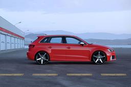 ABS Wheels 355 Black alloy wheel mounted on car in an atmospheric setting