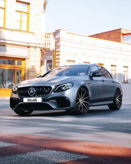 Imaz Wheels FF499 Black alloy wheel mounted on car in an atmospheric setting