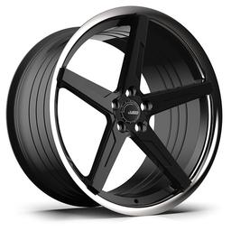 ABS Wheels F55 Svart aluminiumsfelger montert på bil i en stemningsfull omgivelse