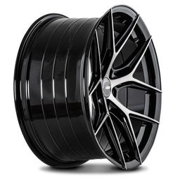 ABS Wheels F5 Musta alumiinivanteet asennettuna autoon tunnelmallisessa ympäristössä