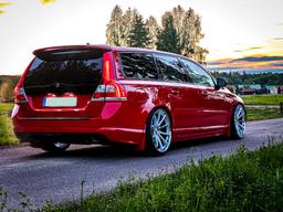 Imaz Wheels FF675 Silver alloy wheel mounted on car in an atmospheric setting