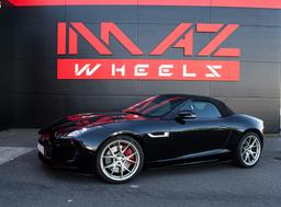 Imaz Wheels FF593 Silver alloy wheel mounted on car in an atmospheric setting