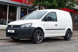 Imaz Wheels FF593 Silver alloy wheel mounted on car in an atmospheric setting