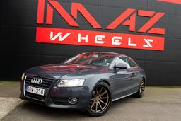 Imaz Wheels FF675 Bronse aluminiumsfelger montert på bil i en stemningsfull omgivelse