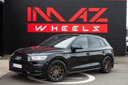 Imaz Wheels FF675 Bronse aluminiumsfelger montert på bil i en stemningsfull omgivelse