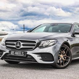 ABS Wheels F16 Bronze alloy wheel mounted on car in an atmospheric setting