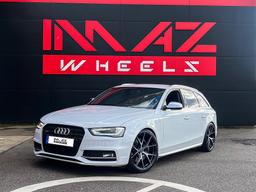 Imaz Wheels FF593 Grå aluminiumfälg monterade på bil i stämnigsfull miljö