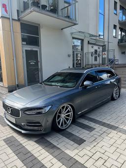 Imaz Wheels FF499 Silver alloy wheel mounted on car in an atmospheric setting