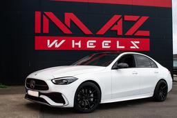 Imaz Wheels FF499 Sort aluminiumsfælge monteret på bil i en stemningsfuld omgivelse