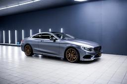 Concaver CVR1 Bronze alloy wheel mounted on car in an atmospheric setting
