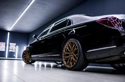 Concaver CVR1 Bronze alloy wheel mounted on car in an atmospheric setting