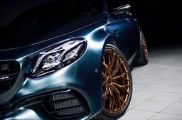 Concaver CVR1 Bronze alloy wheel mounted on car in an atmospheric setting