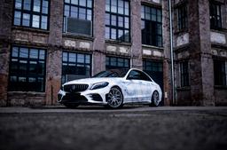 Concaver CVR1 Silver alloy wheel mounted on car in an atmospheric setting