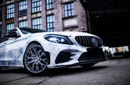 Concaver CVR1 Silver alloy wheel mounted on car in an atmospheric setting