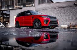 Concaver CVR1 Black alloy wheel mounted on car in an atmospheric setting