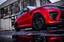 Concaver CVR1 Black alloy wheel mounted on car in an atmospheric setting