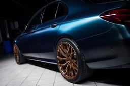 Concaver CVR1 Bronze alloy wheel mounted on car in an atmospheric setting