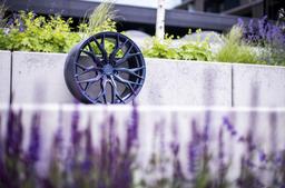 Concaver CVR1 Custom alloy wheel mounted on car in an atmospheric setting